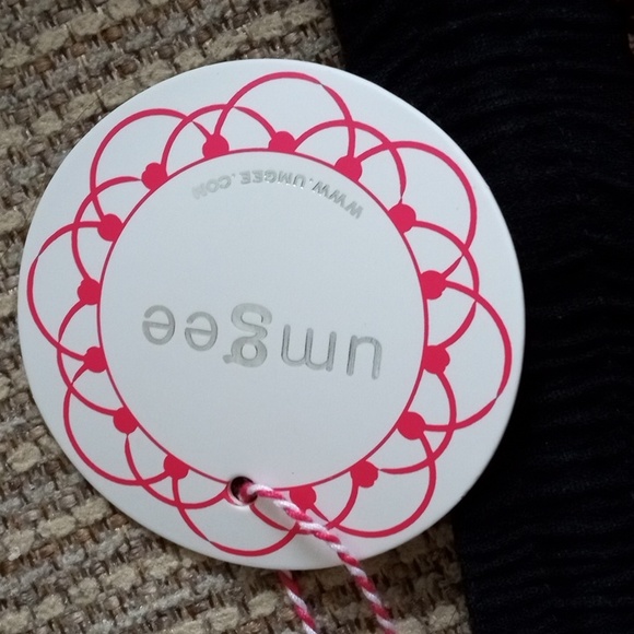 Umgee medium animal print front, solid black cheeky shorts with fringed hem. NWT - Picture 3 of 7